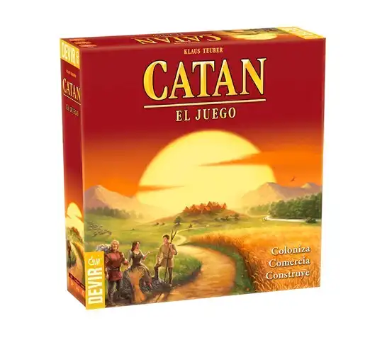 Pudełko gry planszowej Catan z obrazkiem zachodu słońca.